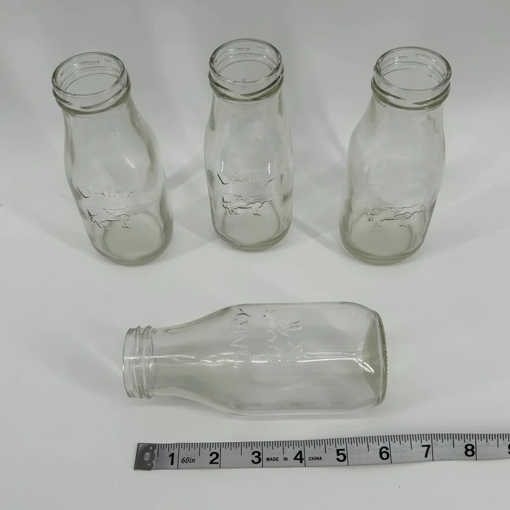 Set of 4 Vintage Style Glass Milk Bottles Embossed Cow Dairy Farmhouse Decor
